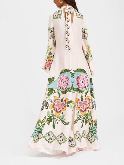 Elegant Floral Print Maxi Dress with Flowing Design